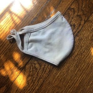 white and yellow tie dye mask